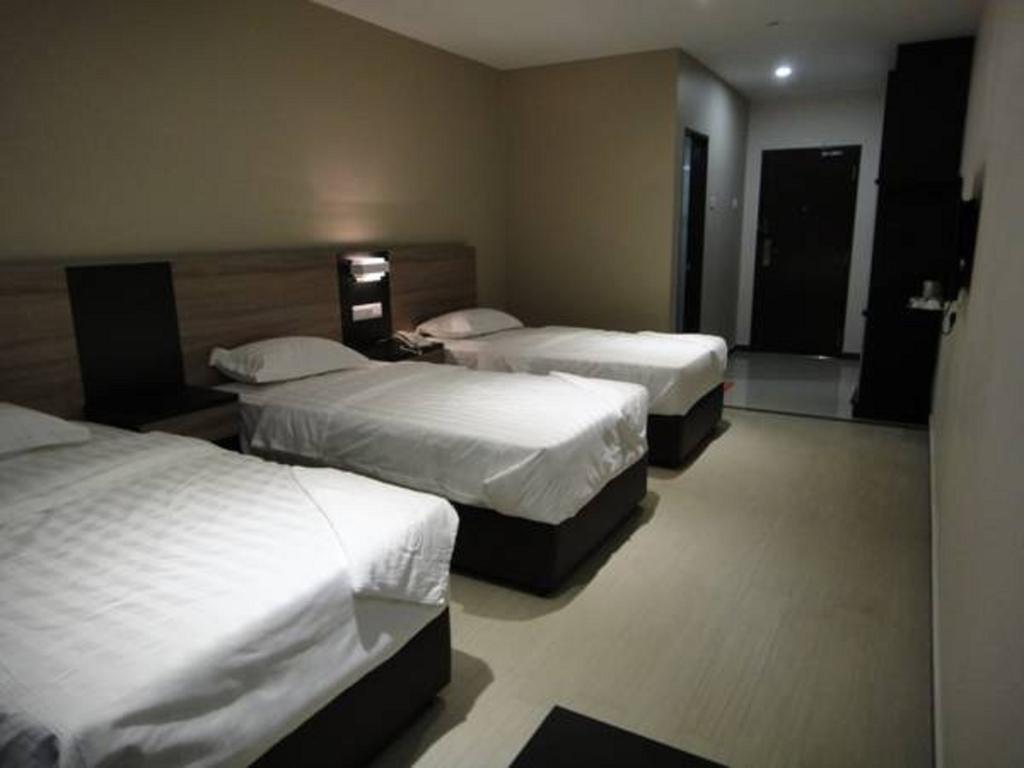 Galaxy Hotel Simpang Ampat  Quarto foto