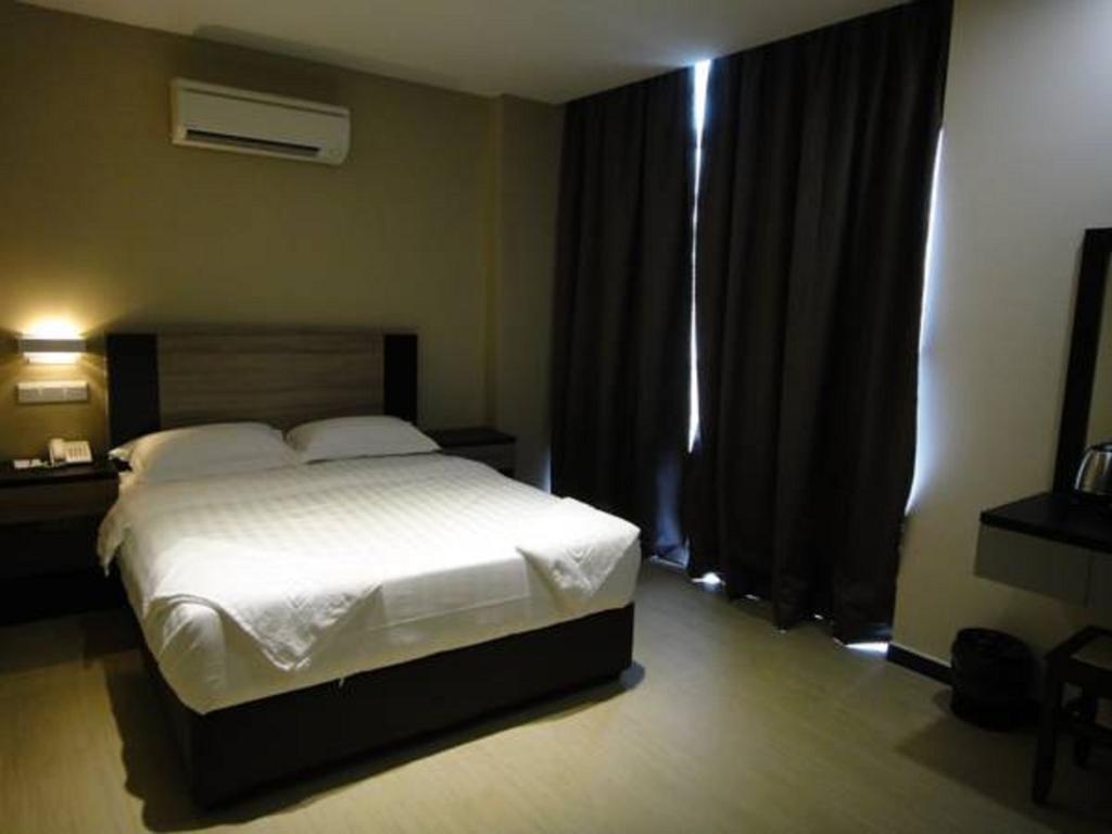 Galaxy Hotel Simpang Ampat  Quarto foto