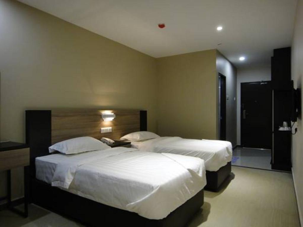Galaxy Hotel Simpang Ampat  Quarto foto