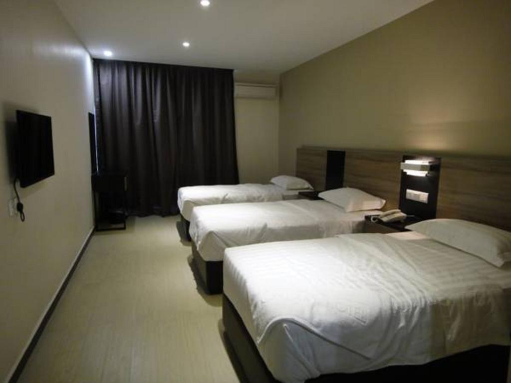 Galaxy Hotel Simpang Ampat  Quarto foto