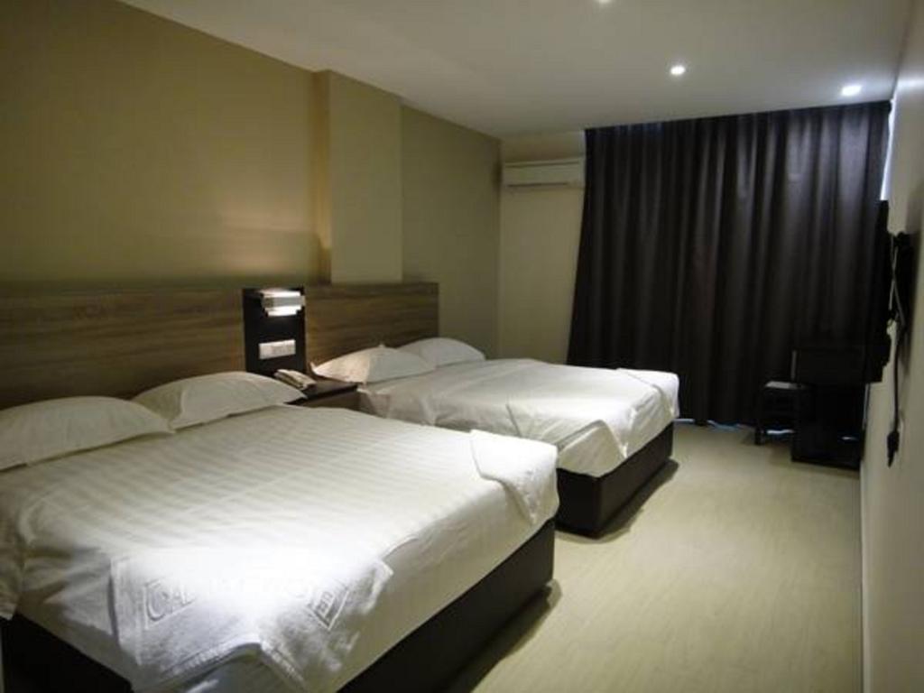 Galaxy Hotel Simpang Ampat  Quarto foto